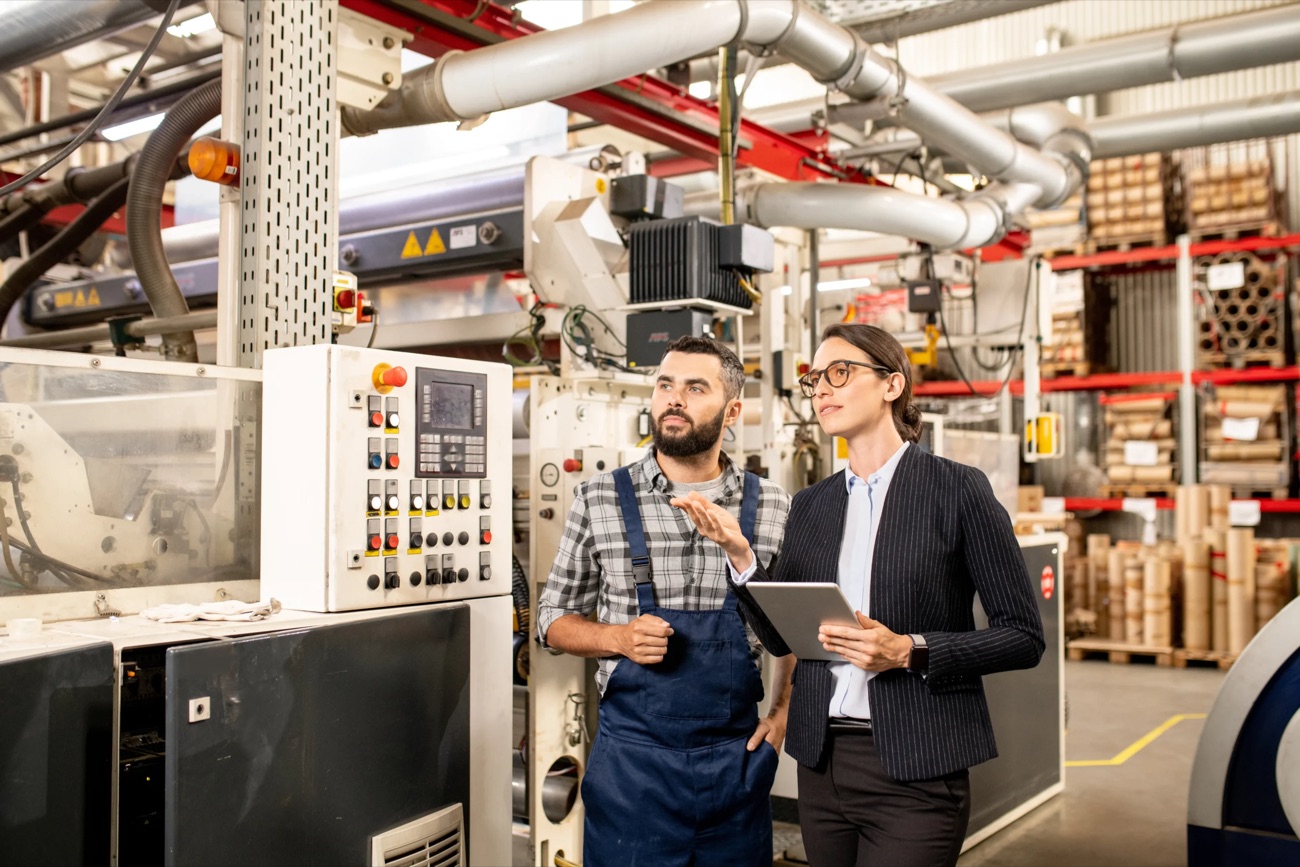 Two Maya Consulting specialists reviewing technical results